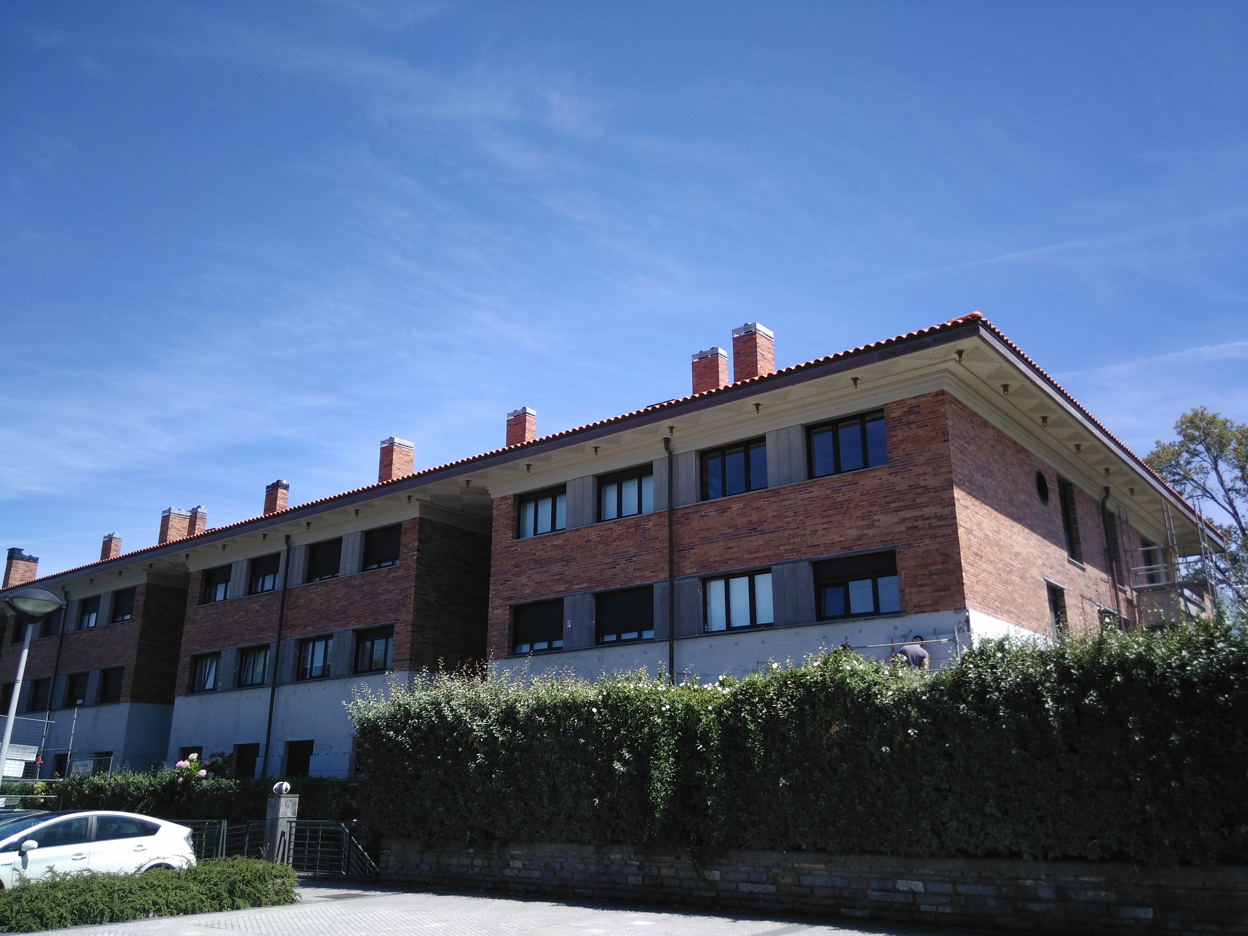 Rehabilitación de fachada Puio 2-4 : Harri Construcciones & Mampostería